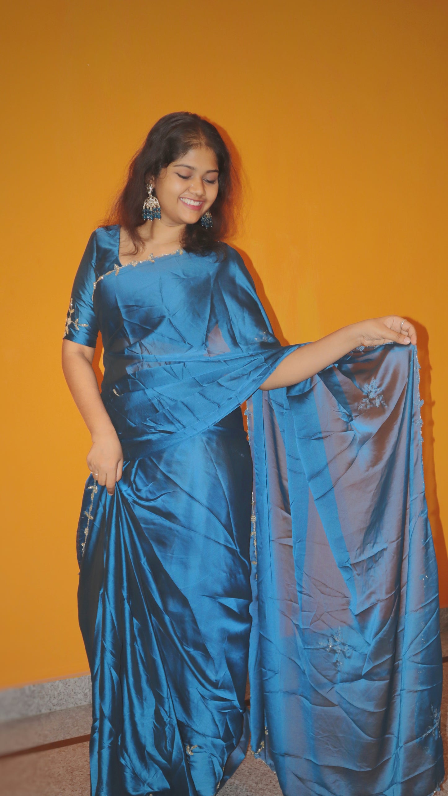 "Classic satin saree with minimal work with running blouse