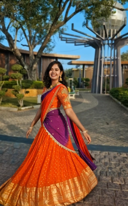 Dazzling Bright Orange & Royal Purple Half Saree with Shimmering Golden Accents, Perfect for a Mesmerizing Festive Glow! paired with a matching running blouse (unstitched for a perfect custom fit).✨💃🌅"
